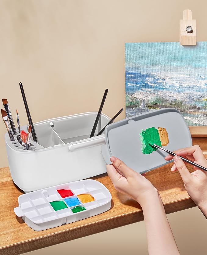 GAMENOTE Paint Brush Cleaner, Paint Brush Holder and Palette, White | All-in-one painting station washes and rests brushes, mixes colors, and stores paint in 18 wells with a portable handle.