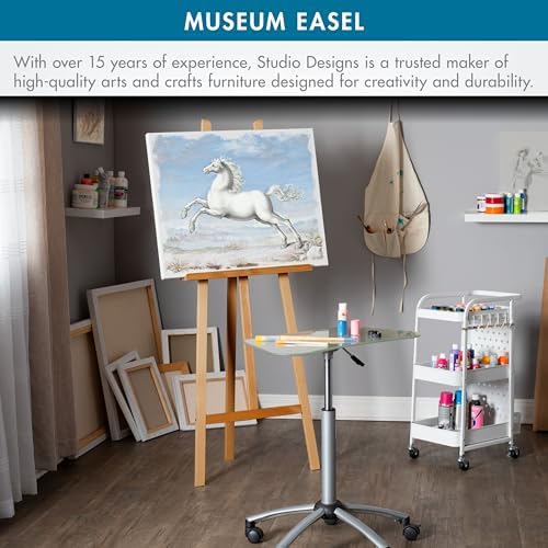 Studio Designs Museum Display Easel – Adjustable Solid Wood Stand for Painting, Sketching, Wedding & Event Signs, Posters, Photography, Home Decor – Foldable, Lightweight, 60–63” Natural Wood