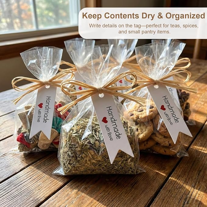 100 Pcs 4.7x7" Plastic Cellophane Bags with 131ft Raffia Ties & 100 Pcs "Handmade with Love" Tags, Clear Goodie Treat Wrappers for Wrapping Homemade Soap Craft Gift Wedding Cookies Candy Snack Party Bakery Favors Christmas (White Tags)