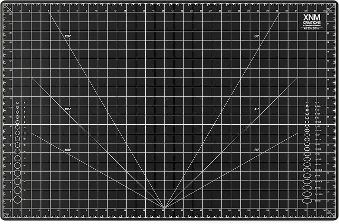 XNM Premium Self Healing Cutting Mat - 24 Inches by 36 inches - A1, 3 Layer Quality PVC Construction - Dual Sided, Imperial and Metric Grid Lines - Perfect for Cutting, Sewing, and Crafts